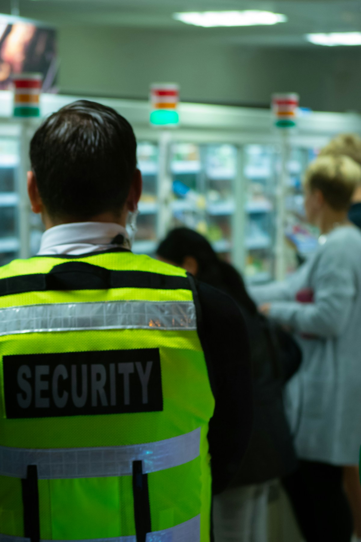 Security officer patrolling a warehouse