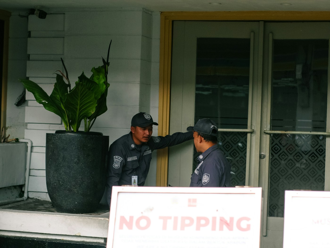 Security team coordinating at an entrance